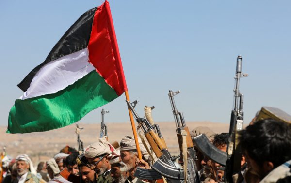 Houthi Rebels Holding Palestinian Flag. Khaled Abdullah/Reuters