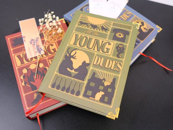 A photo of hardback copies of All The Young Dudes for sale by Vhomestore on Etsy.